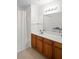 Bathroom features white countertops with a vanity and a shower and bathtub combination at 4014 Santa Maria Dr # 101, Kissimmee, FL 34741