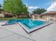 Sparkling community pool with a spacious deck area for lounging and relaxation at 405 Eron Way # 39, Winter Garden, FL 34787