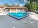Refreshing community pool area with comfortable seating for residents to enjoy at 405 Eron Way # 39, Winter Garden, FL 34787
