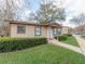 Side view of a well-maintained single-story home with neat landscaping and a cozy appearance at 405 Eron Way # 39, Winter Garden, FL 34787