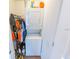 Efficient laundry area featuring a stacked washer and dryer at 405 Eron Way # 39, Winter Garden, FL 34787