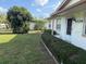 The home has well-maintained landscaping and a charming facade at 4339 Solomon Dr, Orlando, FL 32811