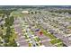 Community aerial view featuring neighborhood streets, various rooftops, and neighborhood layout at 4492 Bluff Oak Loop, Kissimmee, FL 34746