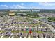 Aerial view of a residential neighborhood near Sunrise Elementary School, highlighting a Gathering-friendly community at 4492 Bluff Oak Loop, Kissimmee, FL 34746