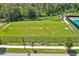 A well-maintained community soccer field with goals and lush green grass, perfect for recreational activities at 4492 Bluff Oak Loop, Kissimmee, FL 34746