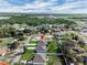 Neighborhood aerial view featuring a property with a well-manicured lawn and convenient access to nearby amenities at 4613 Madison Ave, Lake Wales, FL 33859