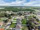 Neighborhood aerial view featuring a property with a well-manicured lawn and convenient access to nearby amenities at 4613 Madison Ave, Lake Wales, FL 33859