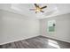 Bright bedroom with a ceiling fan and large window at 4613 Madison Ave, Lake Wales, FL 33859