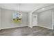 Dining area featuring wood floors, neutral walls, and modern lighting at 4613 Madison Ave, Lake Wales, FL 33859