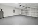 Spacious garage with an automatic door opener and room for storage or parking at 4613 Madison Ave, Lake Wales, FL 33859