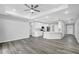 Open living space featuring wood floors, recessed lighting, and open concept design at 4613 Madison Ave, Lake Wales, FL 33859
