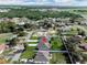 Charming single-Gathering homes in a serene community surrounded by lush green trees and scenic views of a nature preserve at 4615 Madison Ave, Lake Wales, FL 33859
