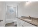 Modern bathroom with tub, granite vanity, and recessed lighting at 4615 Madison Ave, Lake Wales, FL 33859