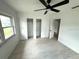 Bright bedroom with natural light, ceiling fan and closet at 5249 Se 106Th Ln, Belleview, FL 34420