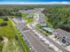 A bird's-eye view of the community, highlighting the layout and surrounding greenery at 7685 Stone Creek Trl, Kissimmee, FL 34747