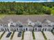Aerial view of townhomes with private driveways, showcasing modern community living at 7685 Stone Creek Trl, Kissimmee, FL 34747