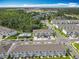 Overhead community view with townhomes, pool and playground at 7685 Stone Creek Trl, Kissimmee, FL 34747