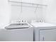 Laundry room featuring washer and dryer with white appliances at 7685 Stone Creek Trl, Kissimmee, FL 34747