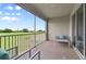 Inviting balcony with seating and scenic views of the landscape at 783 Ocean Course Ave, Davenport, FL 33896