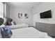 Well-appointed bedroom features twin beds, TV, closet, and dresser at 783 Ocean Course Ave, Davenport, FL 33896