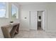 Bright entryway features a console table and a glimpse into the open doorway at 783 Ocean Course Ave, Davenport, FL 33896
