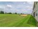 Green golf course view provides a picturesque backdrop to the neighborhood at 783 Ocean Course Ave, Davenport, FL 33896