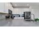 Updated kitchen featuring gray countertops, white cabinets, and stainless appliances at 783 Ocean Course Ave, Davenport, FL 33896