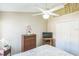 Cozy bedroom with ceiling fan and closet at 7922 Elmstone Cir, Orlando, FL 32822