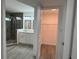 Renovated bathroom showcasing modern vanity and glass-enclosed shower at 793 N Kentucky Ave, Umatilla, FL 32784