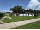Exterior yard and driveway at 793 N Kentucky Ave, Umatilla, FL 32784