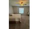Bedroom featuring a comfortable queen size bed with matching comforter and carpet floors at 8057 Marcella Dr, Orlando, FL 32836