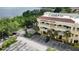 Aerial view of a commercial building called Phoenicia Center with parking lot at 8057 Marcella Dr, Orlando, FL 32836