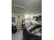 Two-car garage featuring great ceiling height, lots of storage, and laundry machines at 8057 Marcella Dr, Orlando, FL 32836
