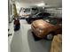 Well-lit two-car garage featuring ample storage space and room for vehicle parking at 8057 Marcella Dr, Orlando, FL 32836