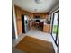 Kitchen featuring wood cabinets, stainless steel appliances, and a door to the backyard at 8057 Marcella Dr, Orlando, FL 32836