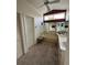 Main bathroom with a large bathtub, double sinks, and ample closet space at 8057 Marcella Dr, Orlando, FL 32836