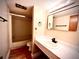 Neutral bathroom featuring a tub/shower and vanity with a marbled countertop and black fixtures at 806 Pinewood Ct # 3135/6, Haines City, FL 33844
