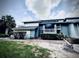 Inviting exterior view of charming home with manicured landscaping and a spacious porch at 806 Pinewood Ct # 3135/6, Haines City, FL 33844