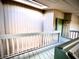 Hallway with a view, showing the entrance door of unit 806 at 806 Pinewood Ct # 3135/6, Haines City, FL 33844