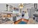 Well-equipped kitchen with granite countertops, stainless steel appliances, custom cabinets, and hardwood flooring at 822 W Patterson St, Lakeland, FL 33803
