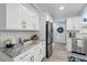 Well-equipped kitchen with stainless steel appliances and plenty of counter space at 911 Mendoza Ln, Kissimmee, FL 34758