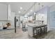Beautiful kitchen featuring granite countertops, stainless steel appliances, and a breakfast bar at 911 Mendoza Ln, Kissimmee, FL 34758