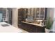 Modern kitchen featuring stainless steel appliances, sleek cabinetry, and a stylish tile backsplash at 9414 Haber Ct, Orlando, FL 32827