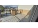 This patio features a sleek metal railing and a view of the neighborhood at 9414 Haber Ct, Orlando, FL 32827