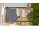 Aerial view of a home's backyard, highlighting the fencing and the lot's layout at 1009 S Ivey Ln, Orlando, FL 32811