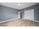 Bedroom featuring wood floors, closet space, and recessed lighting at 1009 S Ivey Ln, Orlando, FL 32811