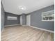 Cozy bedroom with wood floors and closet space at 1009 S Ivey Ln, Orlando, FL 32811