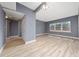 Spacious living room with stylish wood floors and a neutral color scheme at 1009 S Ivey Ln, Orlando, FL 32811