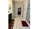 Bathroom with a walk-in closet and glass-enclosed shower providing a luxurious, spa-like experience at 1016 Cascade Dr, Davenport, FL 33837