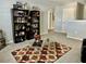 The stylish living room boasts a custom bar, perfect for entertaining guests and relaxing at 1016 Cascade Dr, Davenport, FL 33837
